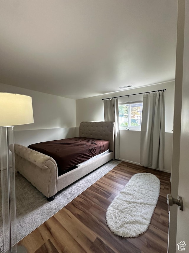 4853 S Woodbridge Dr E Unit 44, Salt Lake City, UT 84117 - bedroom with wood finished floors