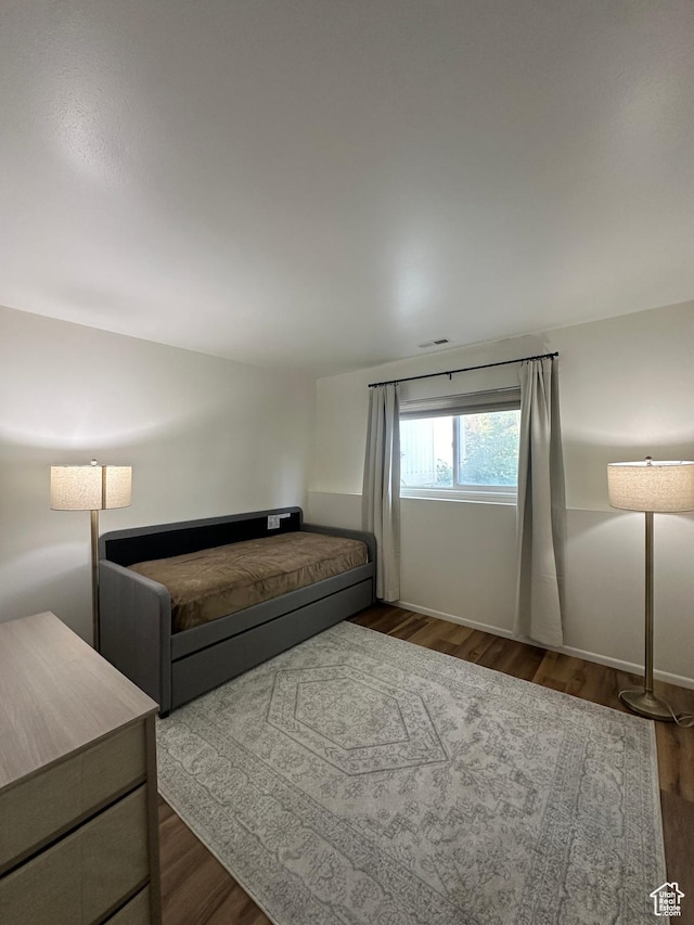 4853 S Woodbridge Dr E Unit 44, Salt Lake City, UT 84117 - living room with wood finished floors and baseboards