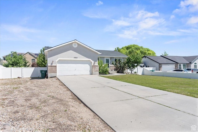 4868 W Cedar Point Peak Dr S, Riverton, UT 84096 - single story home featuring an attached garage, driveway, stucco siding, and a residential view
