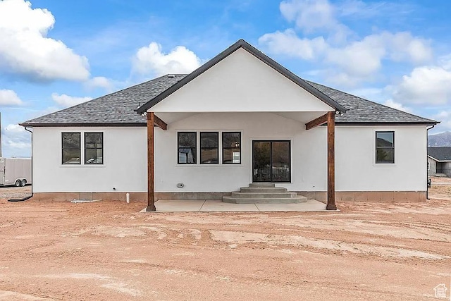 281 N 460 E, Elsinore, UT 84724 - rear view of property with stucco siding and a shingled roof