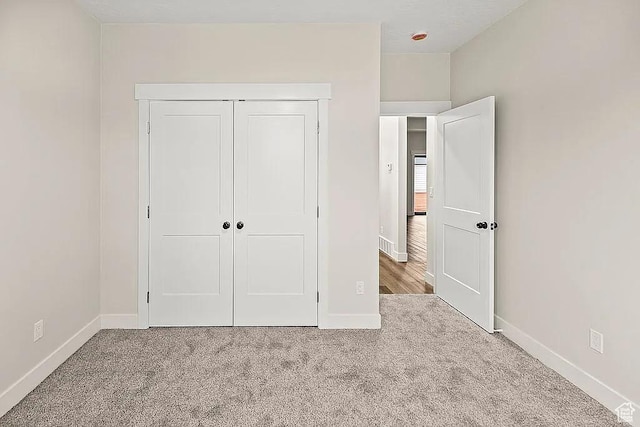 281 N 460 E, Elsinore, UT 84724 - unfurnished bedroom featuring carpet floors, baseboards, and a closet