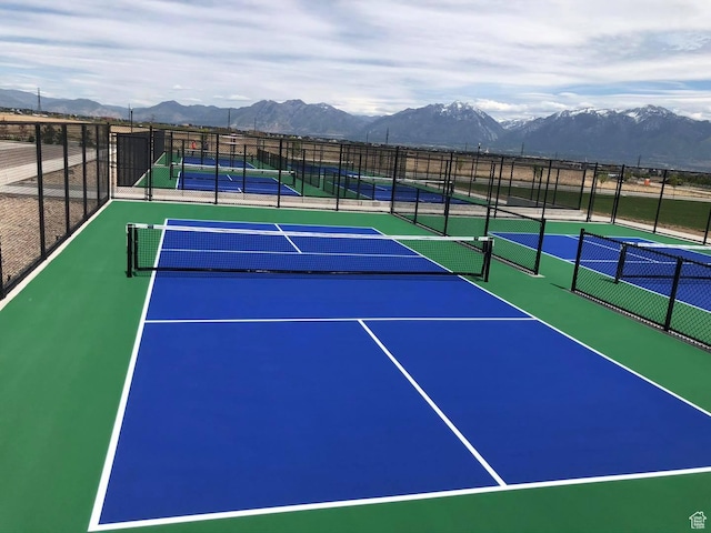 5263 W Reventon Rd S, South Jordan, UT 84009 - view of tennis court with a mountain view and community basketball court