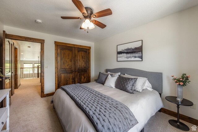 13279 N Alexis Dr, Kamas, UT 84036 - bedroom with light carpet, baseboards, and a closet