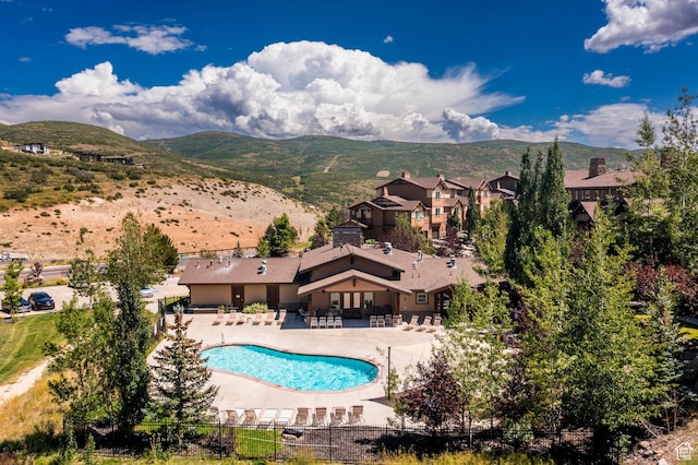 13279 N Alexis Dr, Kamas, UT 84036 - community pool featuring a patio and a mountain view