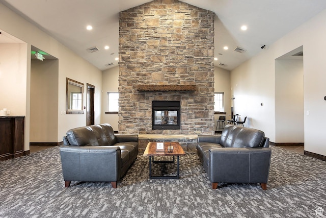 13279 N Alexis Dr, Kamas, UT 84036 - living area featuring high vaulted ceiling, a stone fireplace, recessed lighting, and baseboards