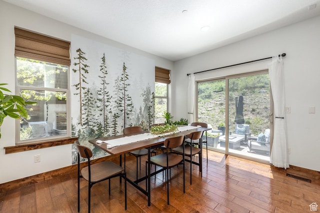 13279 N Alexis Dr, Kamas, UT 84036 - dining area featuring hardwood / wood-style flooring and baseboards
