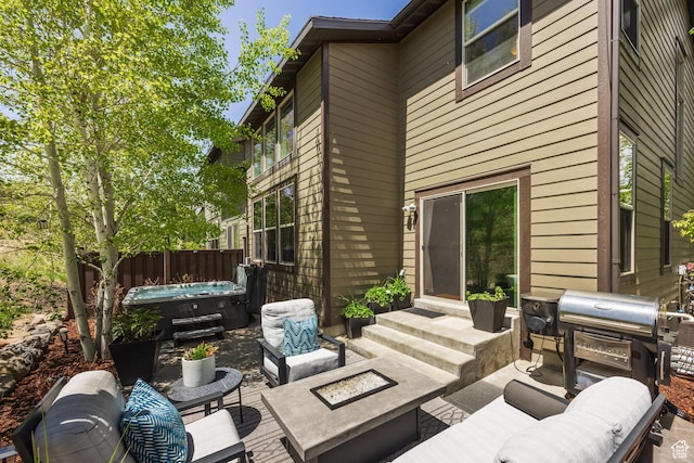 13279 N Alexis Dr, Kamas, UT 84036 - view of patio featuring a hot tub, an outdoor living space with a fire pit, and a grill