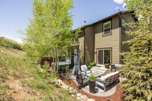 13279 N Alexis Dr, Kamas, UT 84036 - back of property featuring outdoor lounge area and a patio area