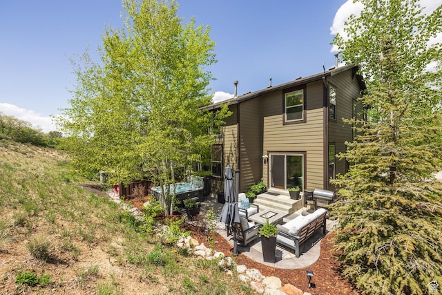 13279 N Alexis Dr, Kamas, UT 84036 - back of house featuring a patio area and outdoor lounge area