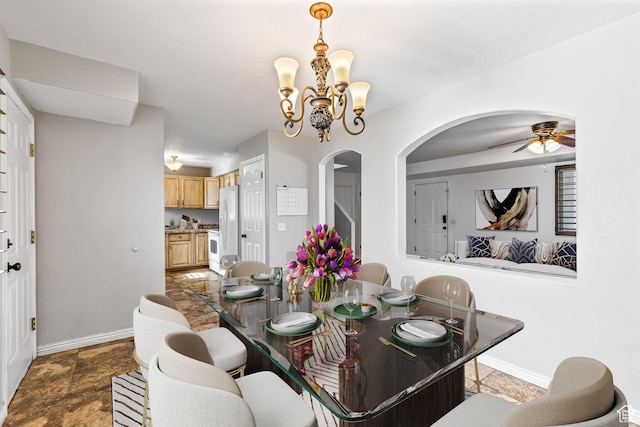 748 N 310 E, Tooele, UT 84074 - dining space with arched walkways, baseboards, a chandelier, and ceiling fan