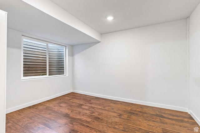 748 N 310 E, Tooele, UT 84074 - spare room with baseboards, dark wood-type flooring, and recessed lighting