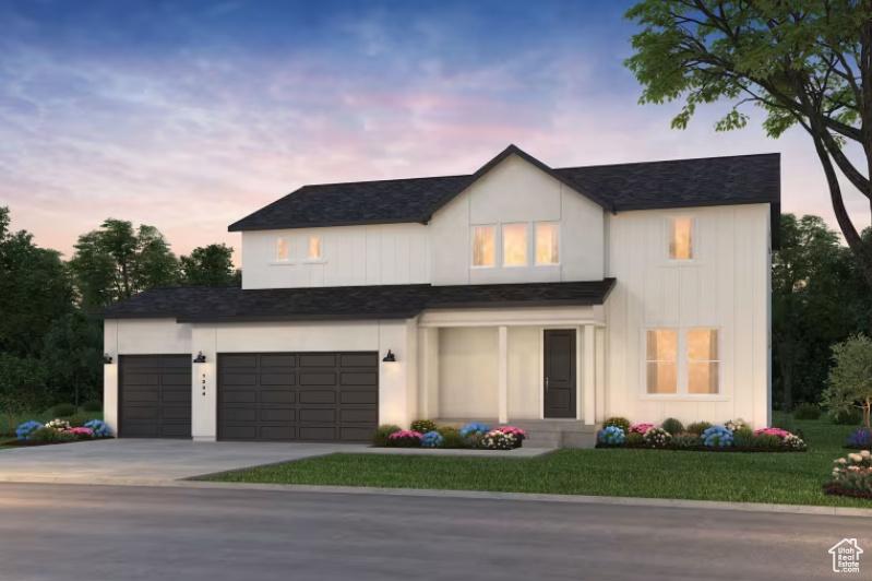 4948 N Topaz Dr Unit 319, Eagle Mountain, UT 84005 - modern farmhouse style home featuring driveway, a front lawn, a shingled roof, and an attached garage
