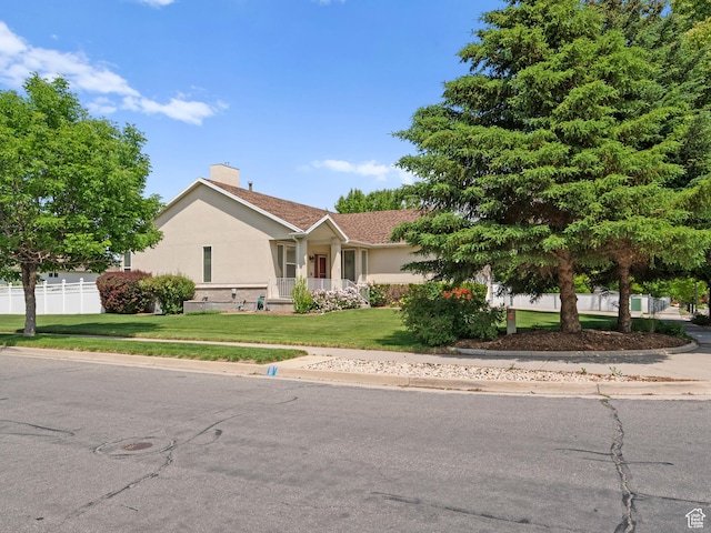 4912 W Rosewood Dr S, South Jordan, UT 84009 - view of front facade with stucco siding and a chimney