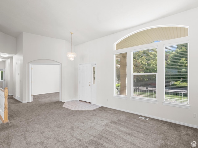 4912 W Rosewood Dr S, South Jordan, UT 84009 - unfurnished living room with carpet, healthy amount of natural light, a chandelier, and baseboards