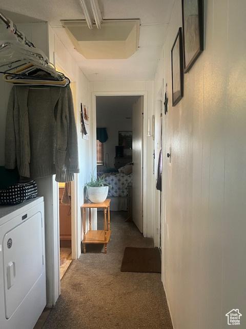 415 E 100 N, Elmo, UT 84521 - hallway featuring washer / clothes dryer and carpet flooring