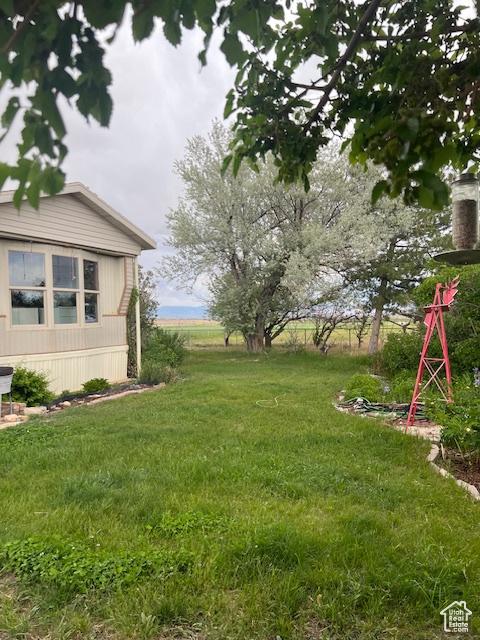 415 E 100 N, Elmo, UT 84521 - view of grassy yard