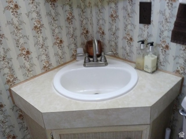 415 E 100 N, Elmo, UT 84521 - bathroom featuring vanity and wallpapered walls