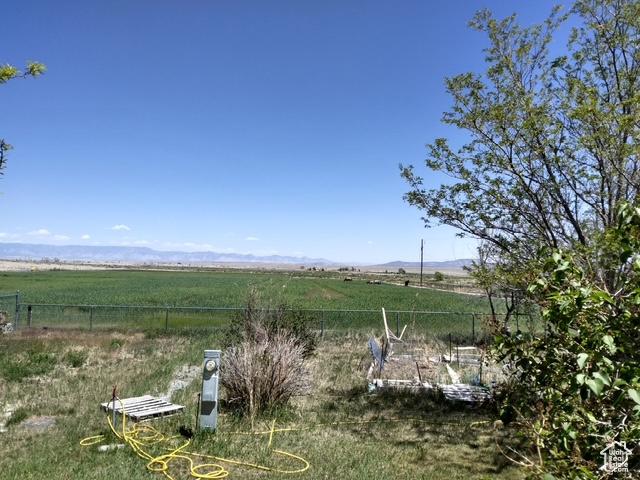 415 E 100 N, Elmo, UT 84521 - view of yard featuring a view of rural / pastoral area and a mountain view
