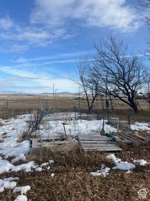 415 E 100 N, Elmo, UT 84521 - yard layered in snow with a view of rural / pastoral area