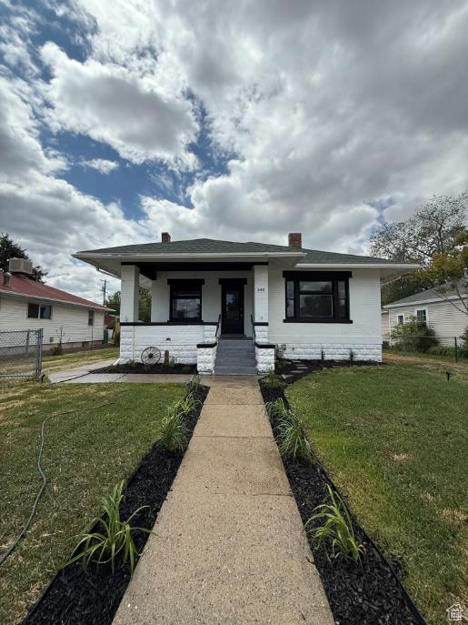 197 W Center St, Midvale, UT 84047 - bungalow-style house with covered porch and a chimney
