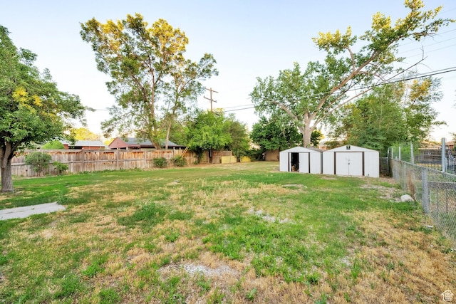 197 W Center St, Midvale, UT 84047 - fenced backyard with a storage shed