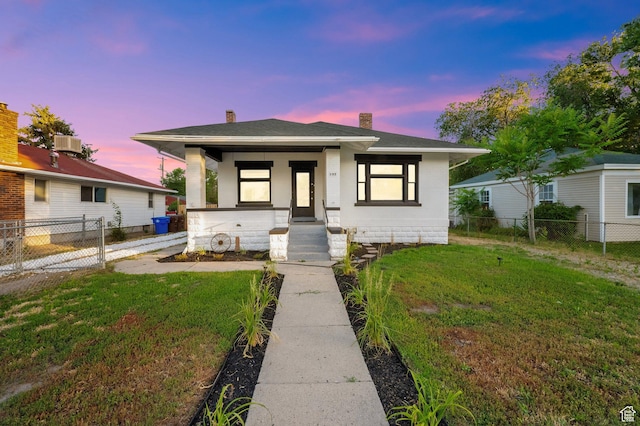 197 W Center St, Midvale, UT 84047 - view of front of property featuring a porch, a chimney, and roof with shingles