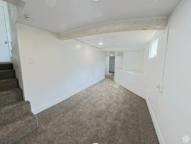 197 W Center St, Midvale, UT 84047 - basement featuring carpet flooring, stairs, baseboards, and a textured ceiling