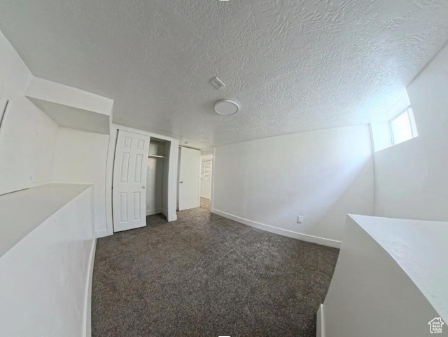 197 W Center St, Midvale, UT 84047 - carpeted empty room featuring a textured ceiling