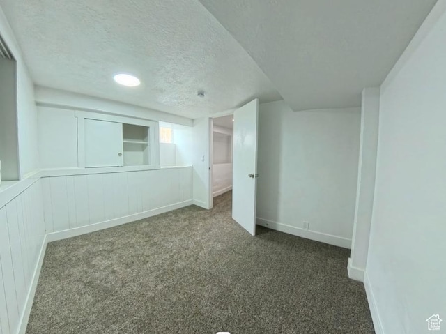 197 W Center St, Midvale, UT 84047 - carpeted empty room featuring a textured ceiling and baseboards