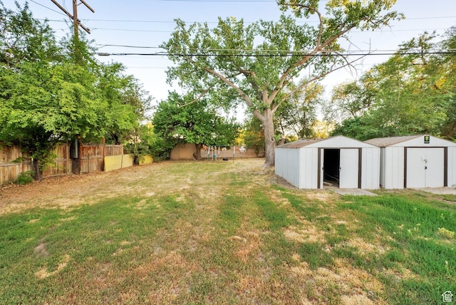 197 W Center St, Midvale, UT 84047 - view of yard featuring a storage unit