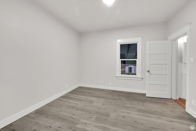197 W Center St, Midvale, UT 84047 - empty room with wood finished floors