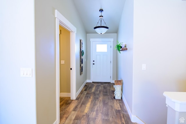 534 S Chan Dr, Grantsville, UT 84029 - entryway with dark wood-type flooring, baseboards, and lofted ceiling