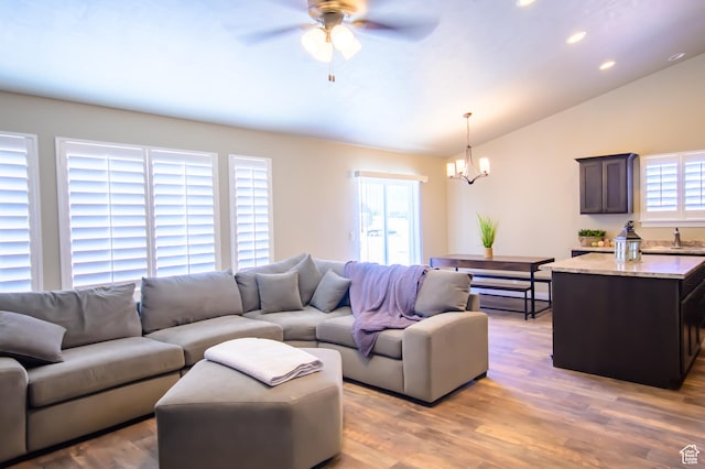 534 S Chan Dr, Grantsville, UT 84029 - living room featuring a chandelier, lofted ceiling, ceiling fan, recessed lighting, and wood finished floors