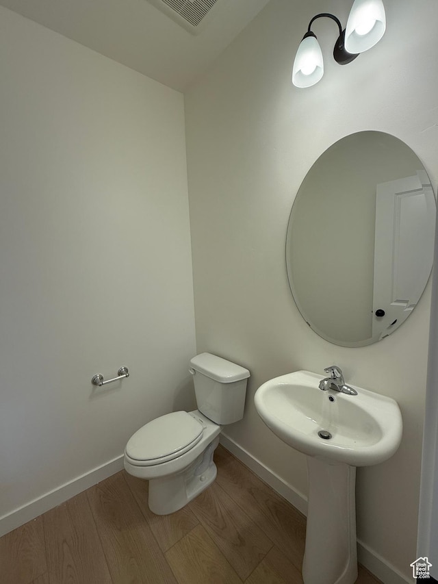814 W 490 S Unit 329, American Fork, UT 84003 - half bathroom with toilet, wood finished floors, and baseboards