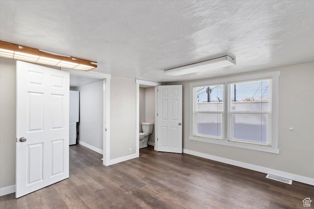 272 S State St, Clearfield, UT 84015 - unfurnished bedroom with baseboards and wood finished floors