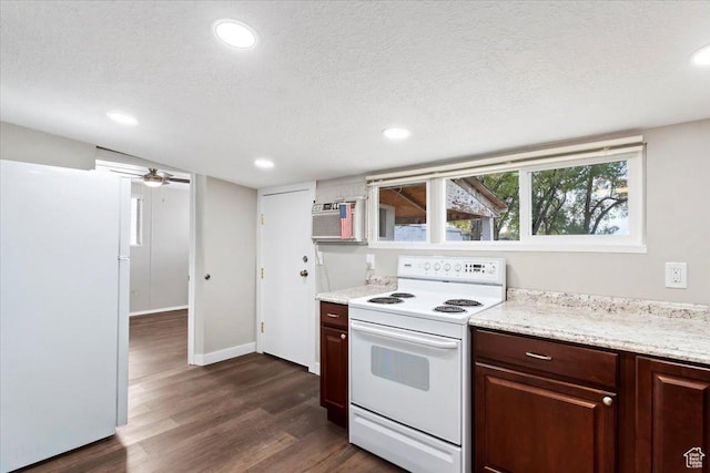 272 S State St, Clearfield, UT 84015 - kitchen with white appliances, dark wood finished floors, recessed lighting, a textured ceiling, and baseboards