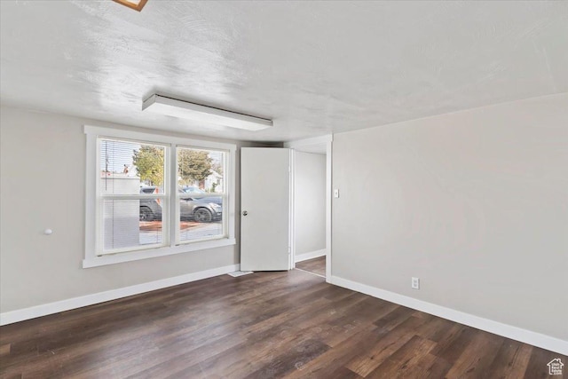 272 S State St, Clearfield, UT 84015 - empty room featuring dark wood finished floors and baseboards