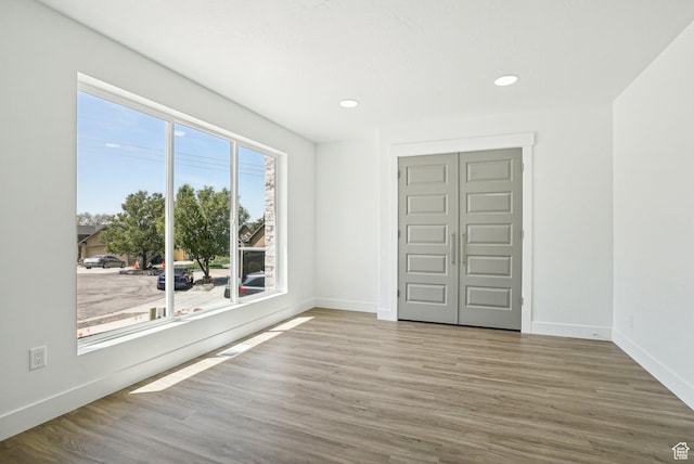 1189 E Benchview Dr, Ogden, UT 84404 - unfurnished bedroom featuring wood finished floors, baseboards, and recessed lighting