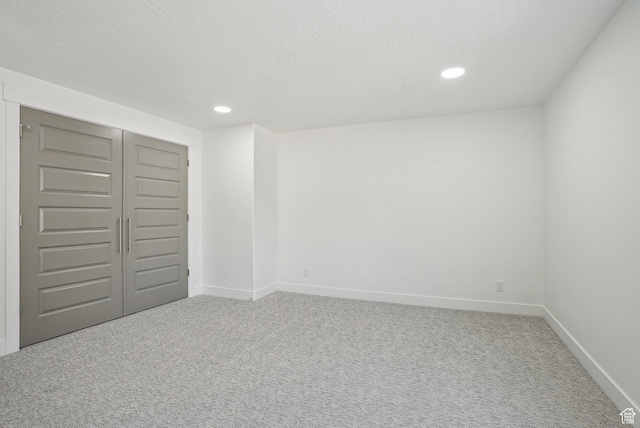 1189 E Benchview Dr, Ogden, UT 84404 - unfurnished bedroom featuring carpet flooring, baseboards, recessed lighting, and a closet