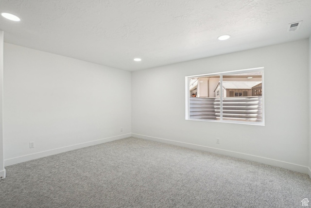 1189 E Benchview Dr, Ogden, UT 84404 - carpeted empty room featuring baseboards, recessed lighting, and a textured ceiling