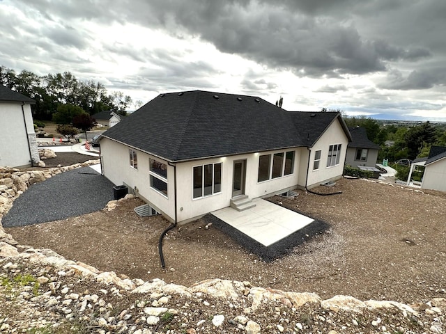 1189 E Benchview Dr, Ogden, UT 84404 - rear view of property with roof with shingles, a patio area, stucco siding, and entry steps