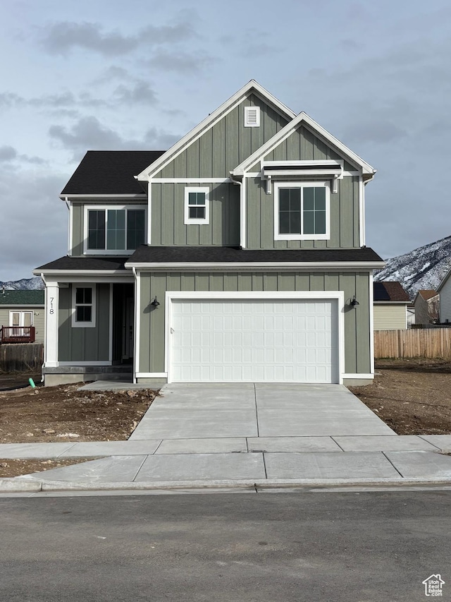 718 N 280 E, Tooele, UT 84074 - craftsman house with driveway and a garage