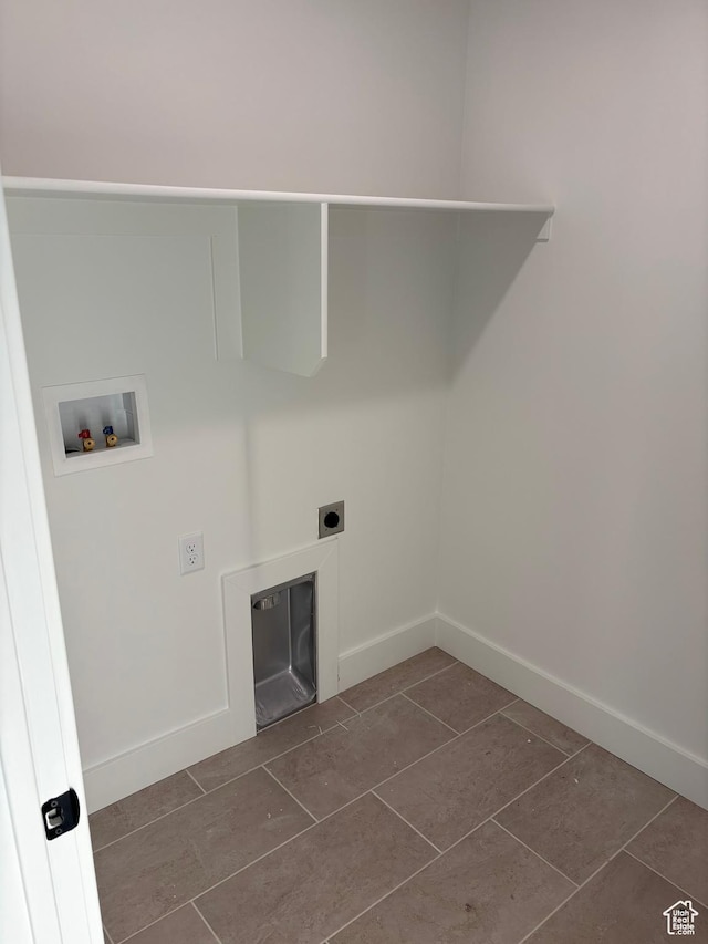 718 N 280 E, Tooele, UT 84074 - laundry room with washer hookup, electric dryer hookup, baseboards, and dark tile patterned floors