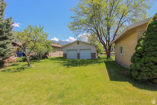 1460 E 2100 N, North Logan, UT 84341 - view of yard featuring a garage, an outdoor structure, and a mountain view
