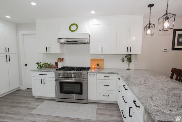 1460 E 2100 N, North Logan, UT 84341 - kitchen featuring high end range, extractor fan, light wood-style floors, recessed lighting, and white cabinetry