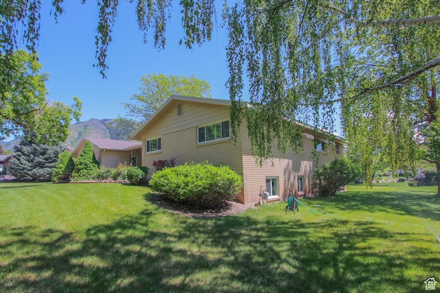 1460 E 2100 N, North Logan, UT 84341 - view of home's exterior with a yard