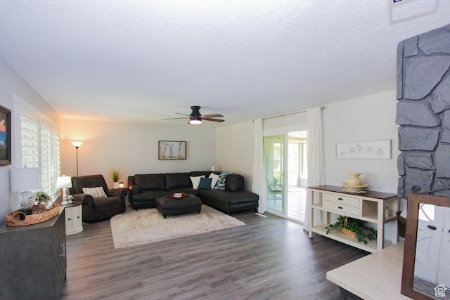 1460 E 2100 N, North Logan, UT 84341 - living room with wood finished floors, a ceiling fan, and a textured ceiling