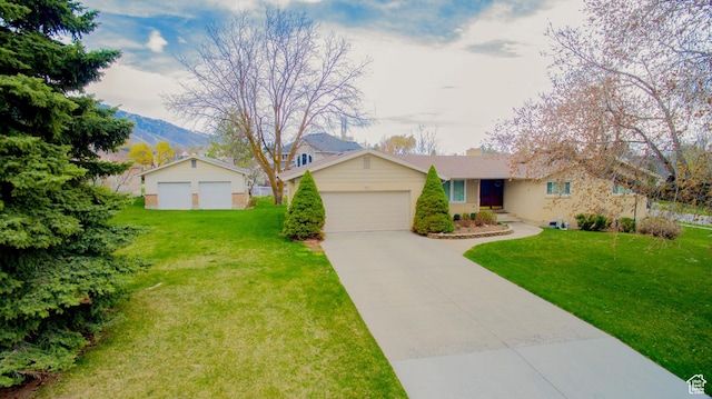 1460 E 2100 N, North Logan, UT 84341 - single story home with a front lawn, a mountain view, and a chimney