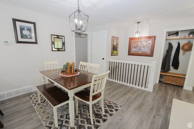 1460 E 2100 N, North Logan, UT 84341 - dining room featuring a chandelier and wood finished floors