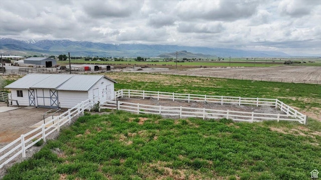 310 E Valley View Dr, Preston, ID 83263 - view of yard with an outdoor structure, a view of countryside, an exterior structure, and a mountain view
